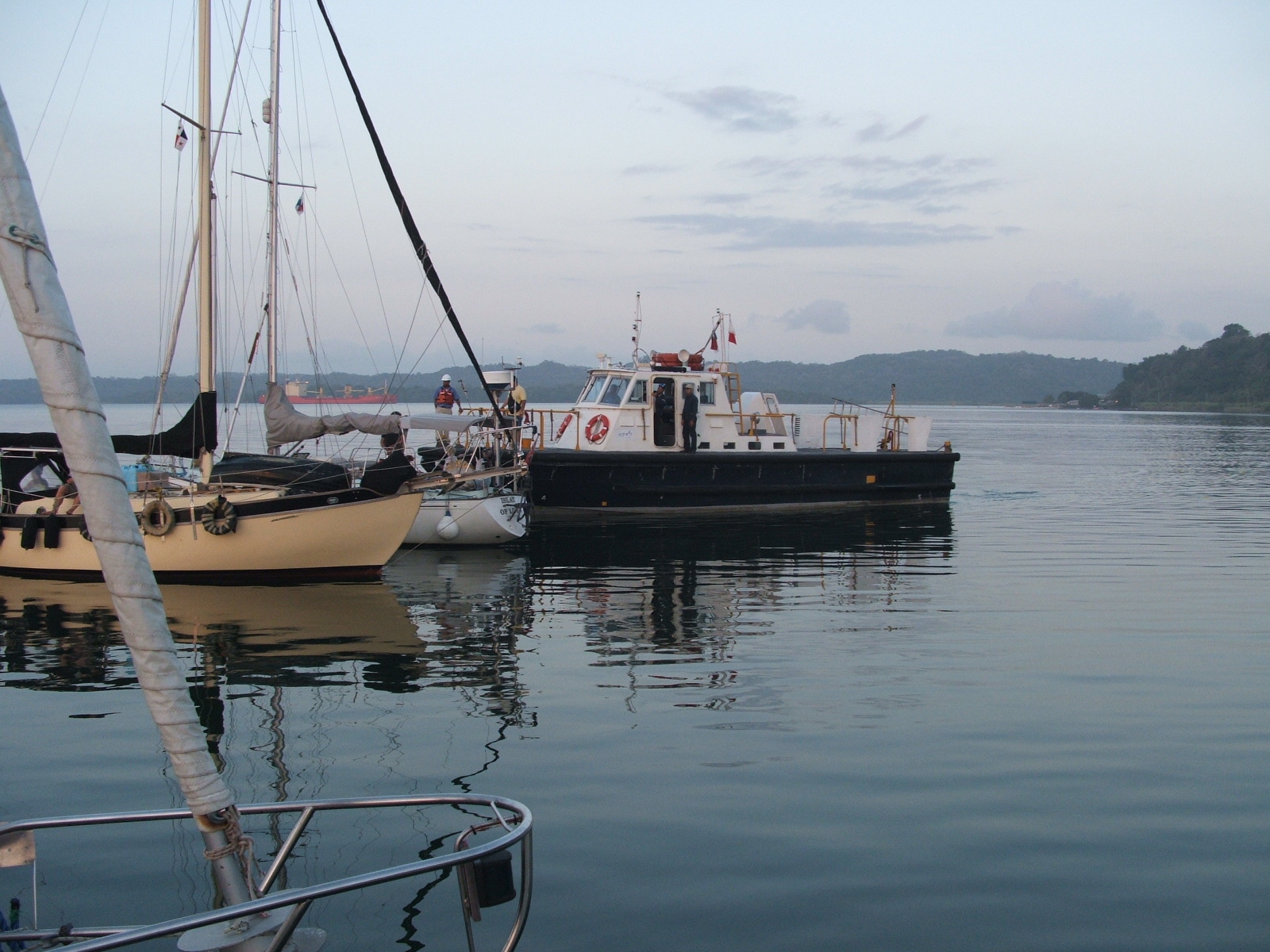 The pilots arrive next morning to guide us through Gatun Lake to the Pacific Locks.

