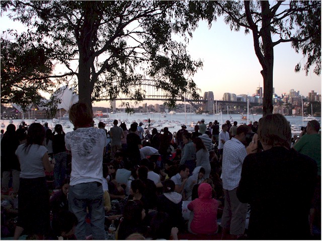 ... we finally squeeze into a spot with a view of the Sydney Harbour Bridge.
