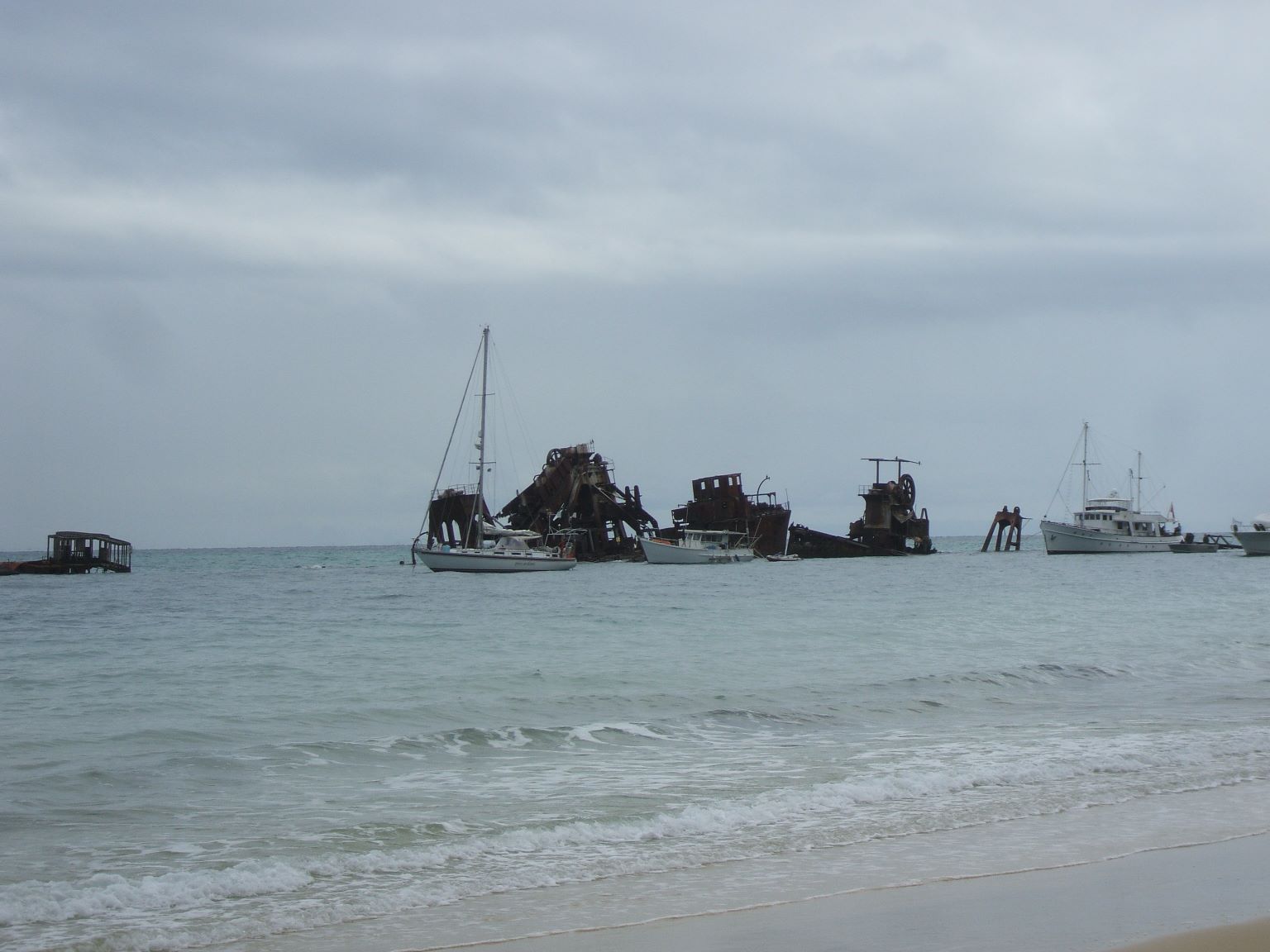 We finally resume cruising July 2011 - anchored amongst the wrecks of Tangalooma at Moreton Island...