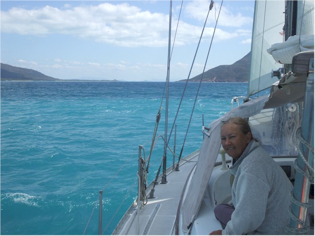 Sailing through Gloucester Passage - note Christine still has a winter fleece on!