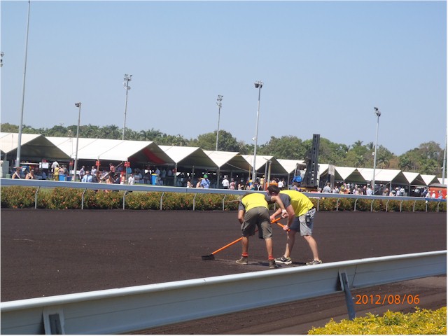 
The dirt race track is sprayed with used engine oil to stop the dust - but makes for very dirty horses and jockeys!