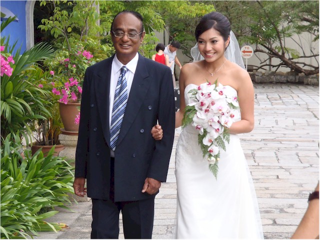 A very proud father, Alaga, arrives with his daughter...
