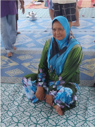 
This was one of the ladies who helped prepare and serve the meal. The Homestay system helps the villages earn money and fill their empty nests when the children move away.
