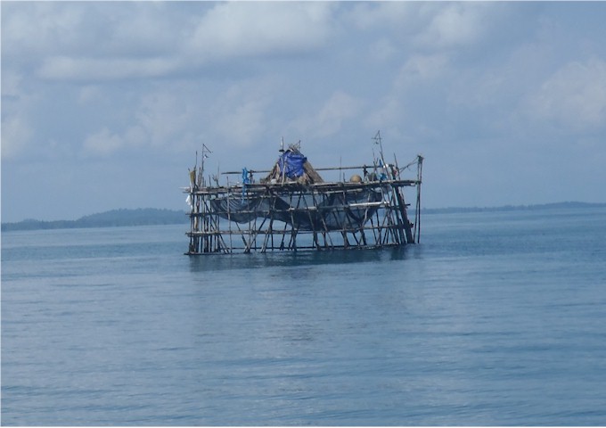 As we get closer to Singapore and Malaysia, the fish farms become more elaborate and huge! No night sailing with these unlit hazards!
