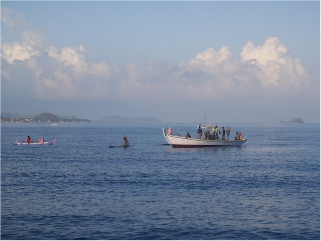 Typical local fishing boat - with hazardous nets and fish traps - at Pulau Bawean.
