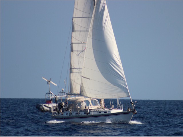 Lop to took this photo of Poco Andante on our way to the Similan Islands.
