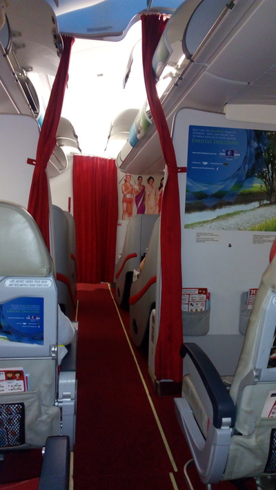 On board Air Asia flight from KL to Beijing - going East so we can cross our path to complete our circumnavigation overland as we head West back to the UK.
