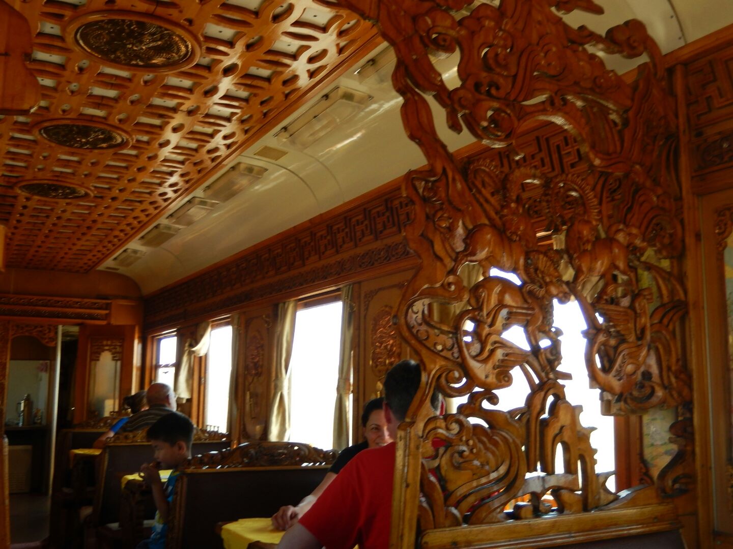 Inside the intricately carved Mongolian dining car.
