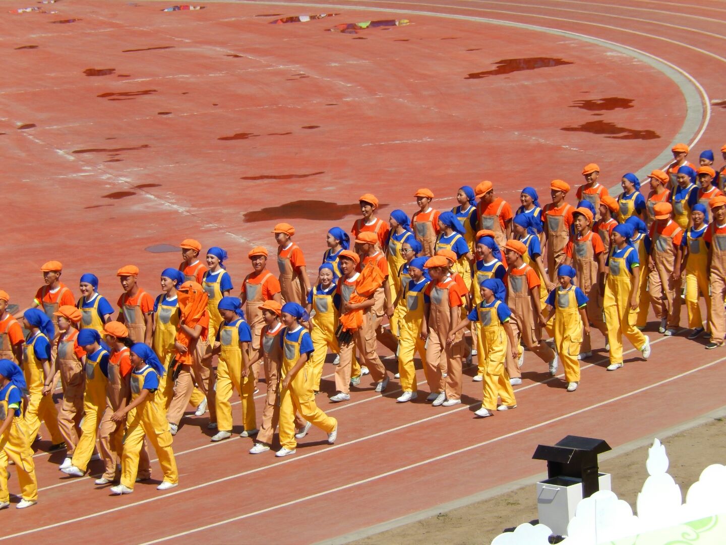 Boys and girls representing the land force during the Communist era.