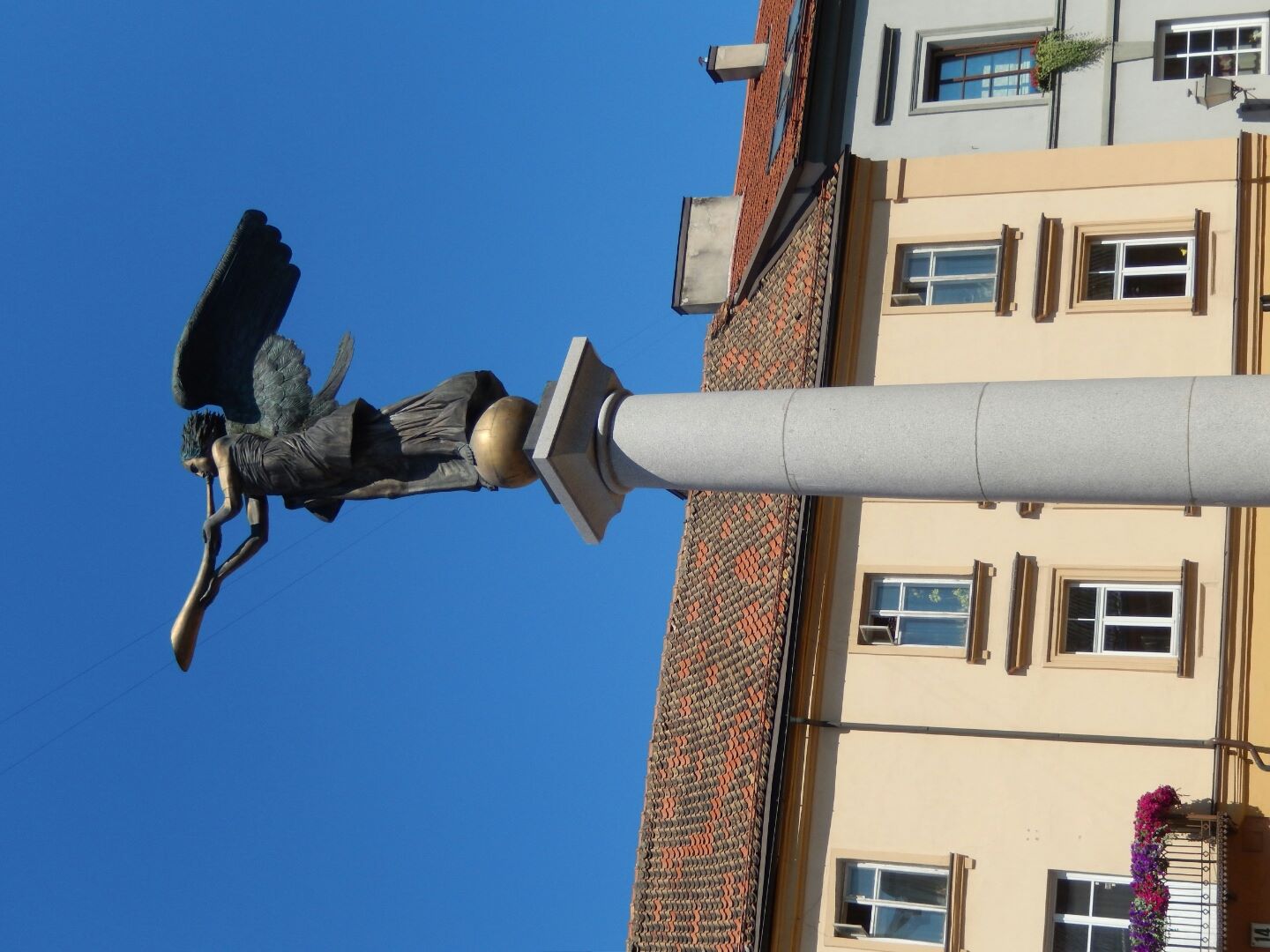 Monument in the central square of Uzupis.
