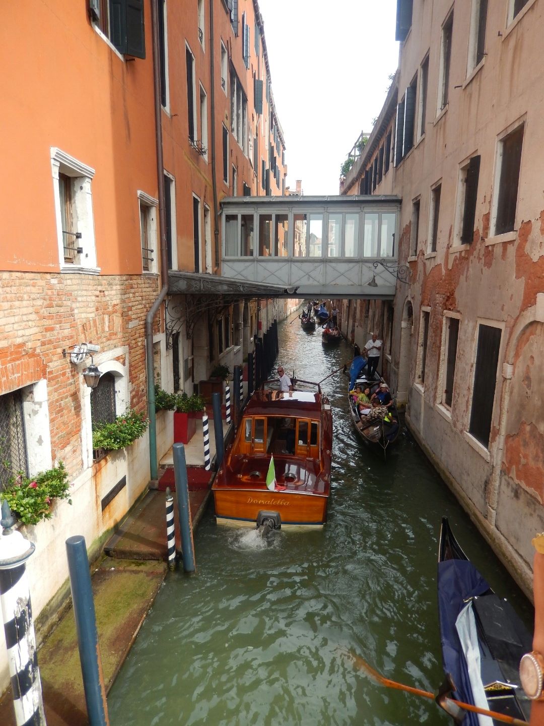 
One of the hotel tenders dropping off guests causes a traffic jam of gondolas!