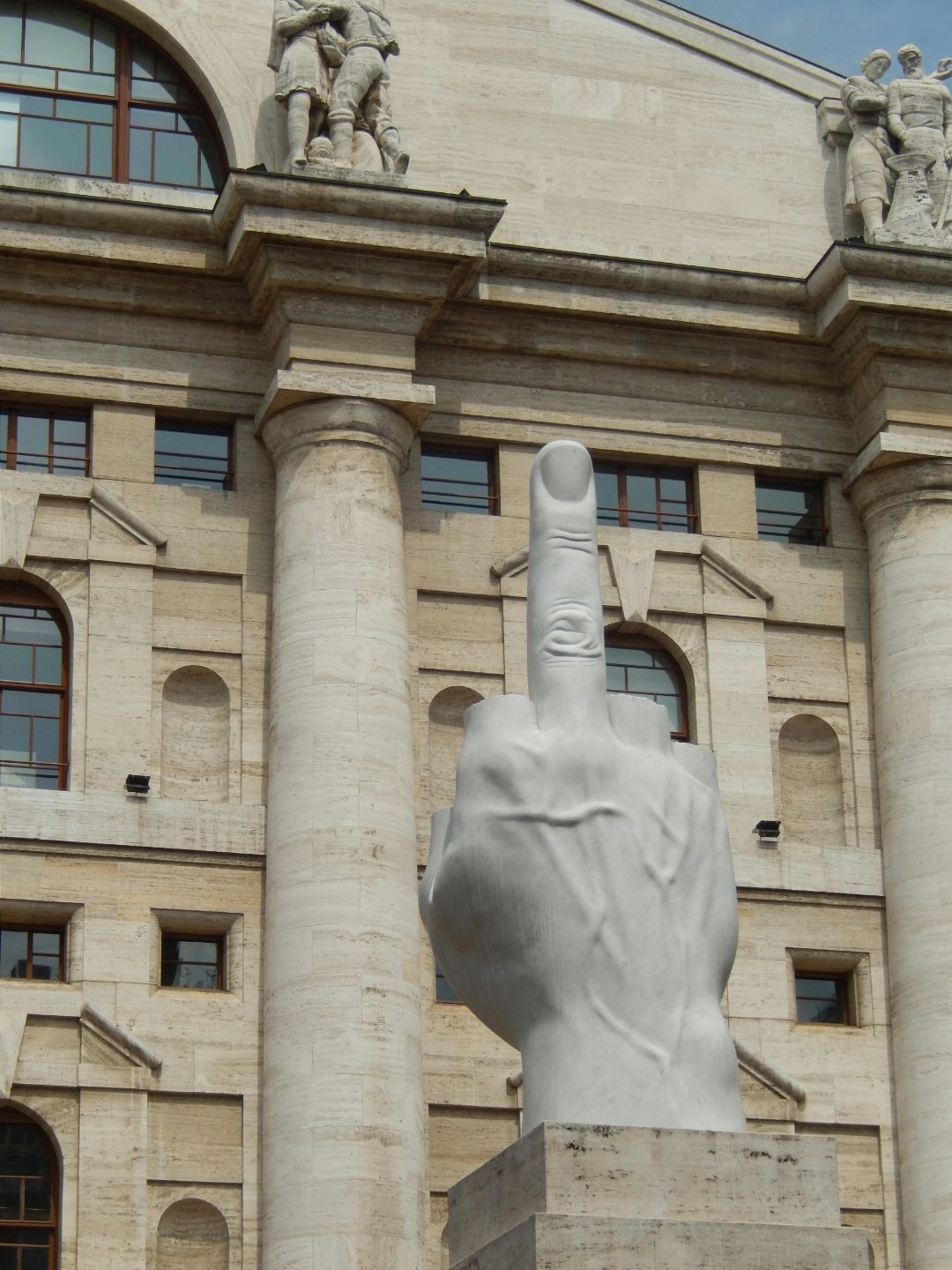 This marble sculpture, by artist Maurizio Cattelan, on display in front of the Milan Stock Exchange provoked controversy...
