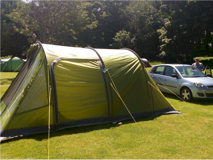 Our car and tent at a lovely campground in the grounds of a stately home.